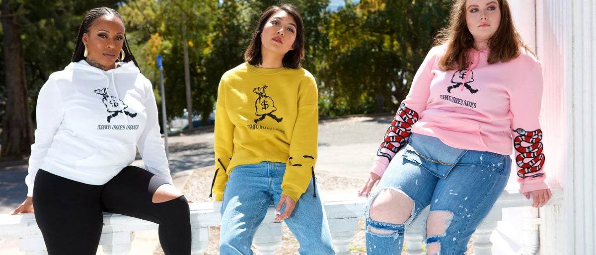 Designed by Neville models wearing statement sweatshirts